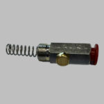 A silver outlet valve with a red spring and metal components.
