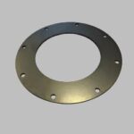A metal plate with a central hole and multiple surrounding screw holes.